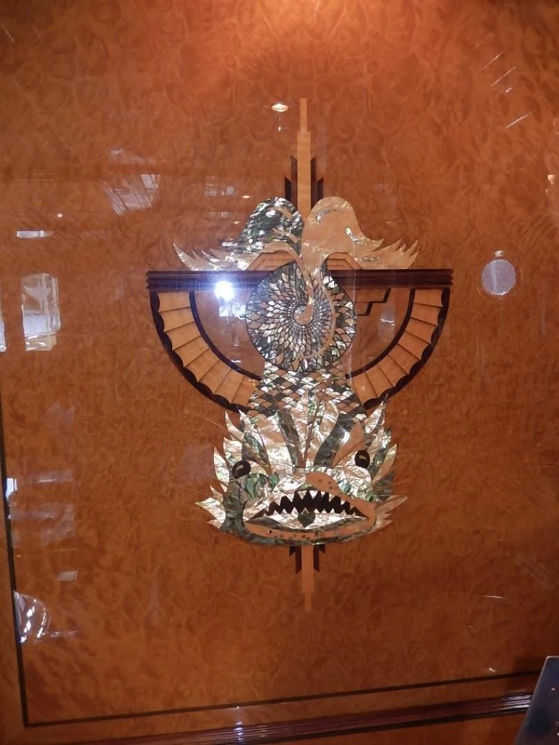 a chandelier on a wooden surface aboard ATLANTIDE Yacht for Sale