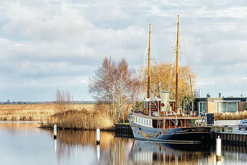 a boat docked at a pier aboard ATLANTIDE Yacht for Sale