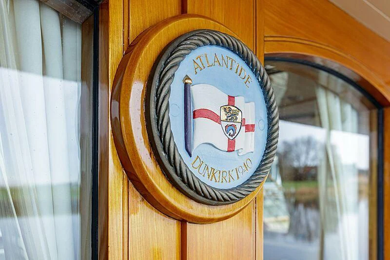 a clock on a door aboard ATLANTIDE Yacht for Sale