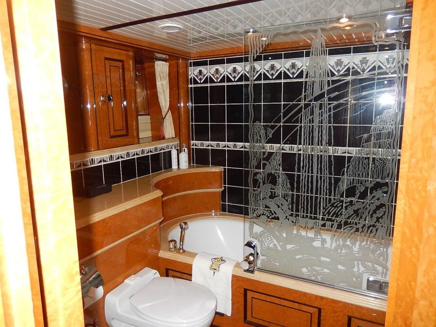 a bathroom with a shower and a sink aboard ATLANTIDE Yacht for Sale