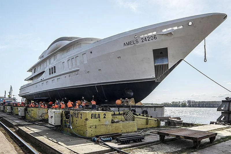 a large ship with a crane aboard AVANTI Yacht for Sale