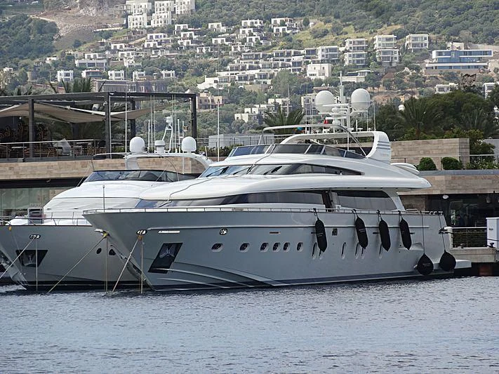 a white boat on the water aboard DESIREE BLEUE Yacht for Sale