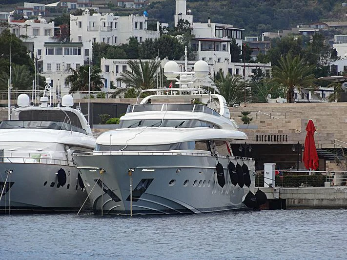 a couple of boats are parked in the water aboard DESIREE BLEUE Yacht for Sale