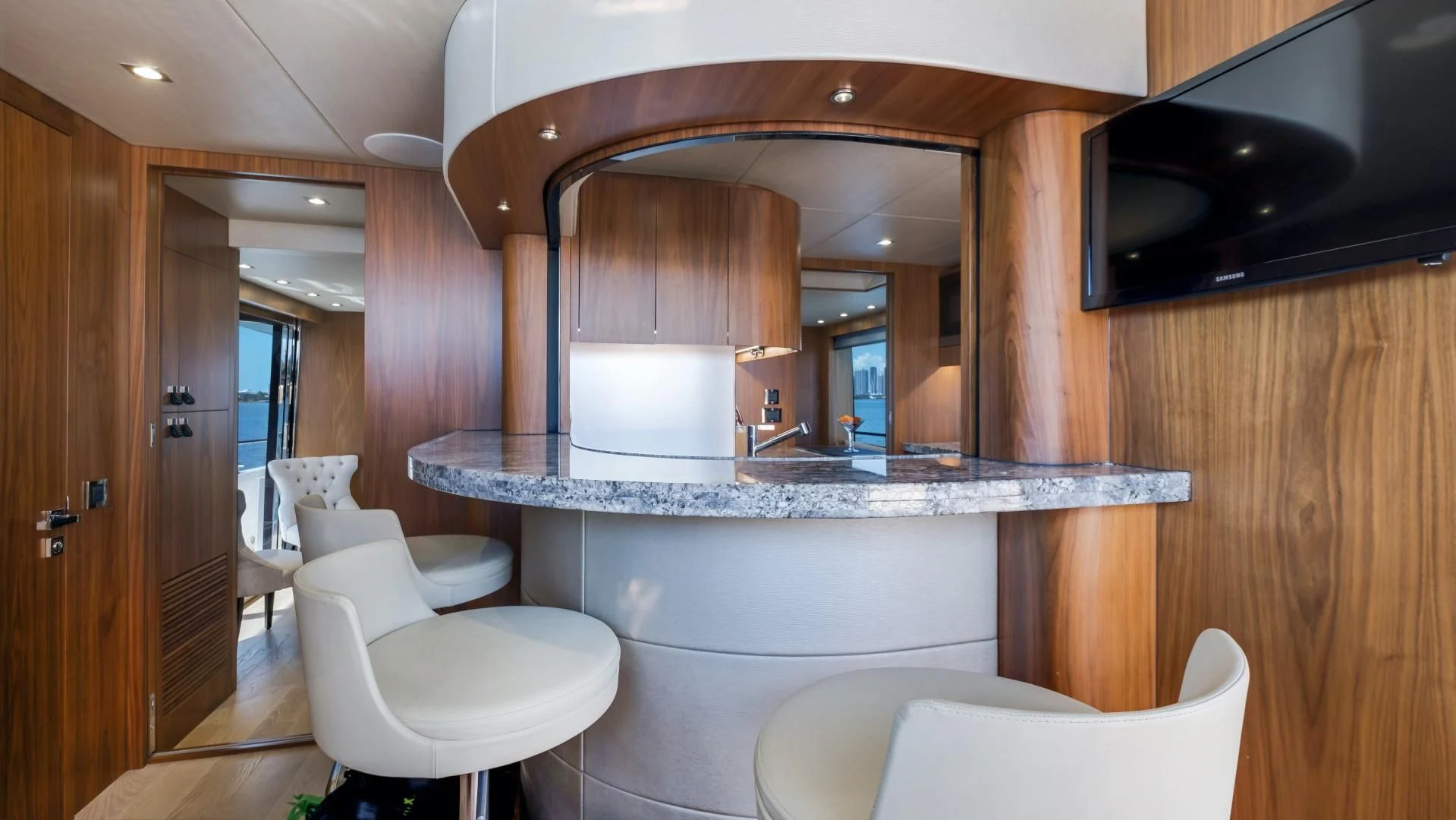 a bathroom with a large mirror aboard SKYCHASER Yacht for Sale