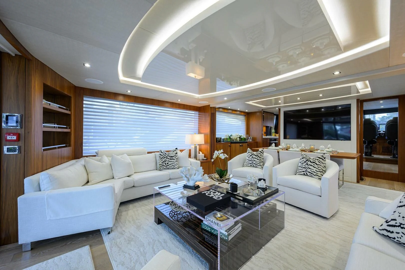 a living room with a couch and a coffee table aboard SKYCHASER Yacht for Sale