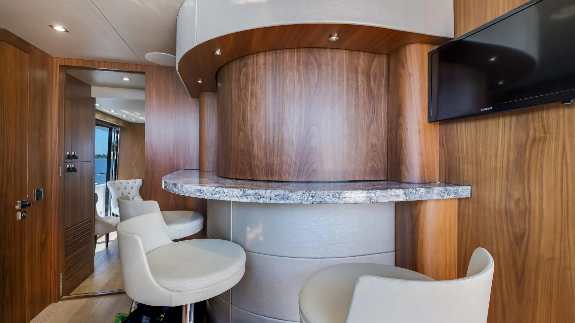 a bathroom with a large wooden cabinet aboard SKYCHASER Yacht for Sale