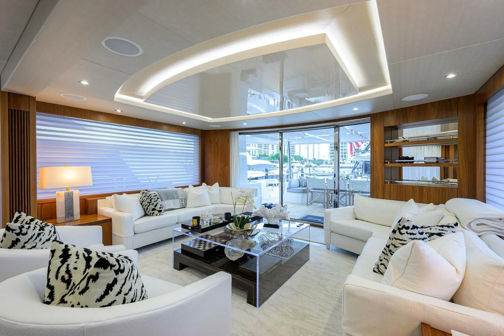 a living room with a large window aboard SKYCHASER Yacht for Sale
