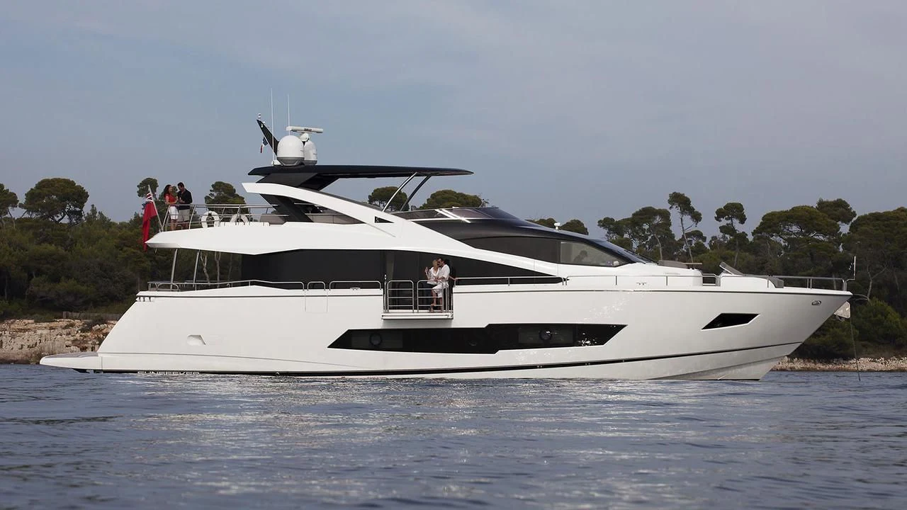 a white yacht on the water aboard SKYCHASER Yacht for Sale