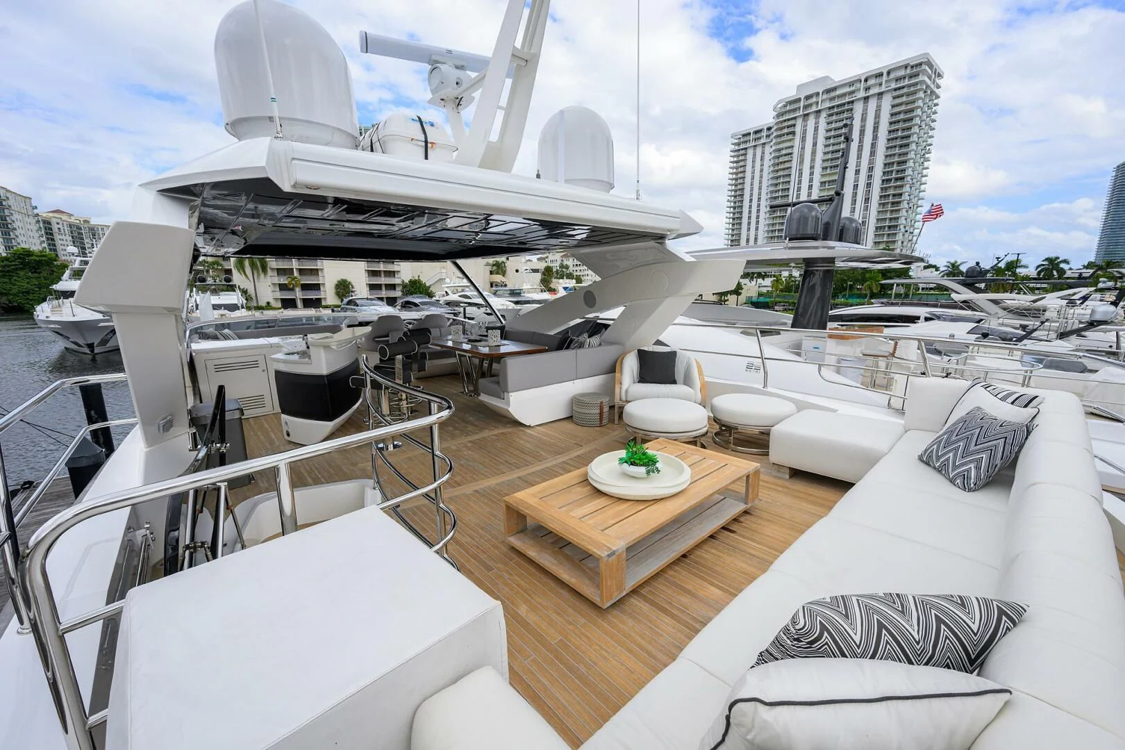 a room with a table and chairs aboard SKYCHASER Yacht for Sale