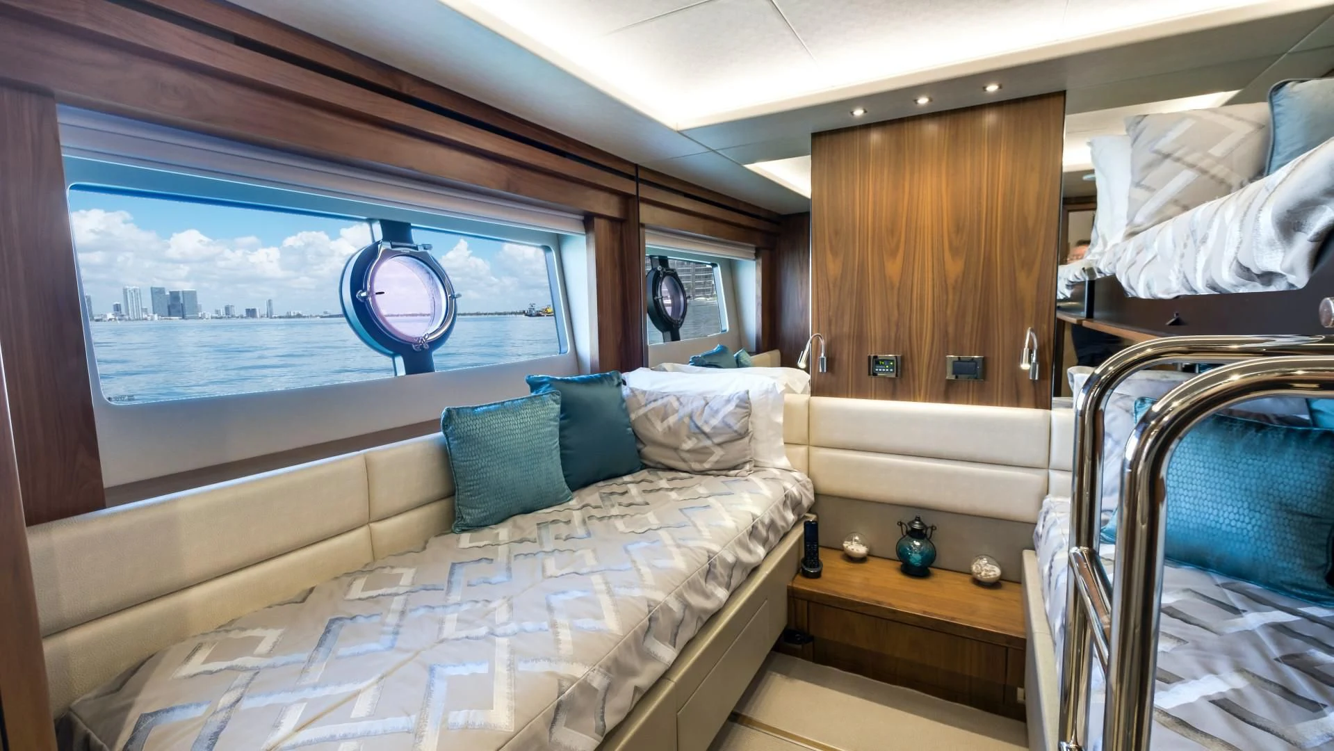 a room with a bed and a window aboard SKYCHASER Yacht for Sale