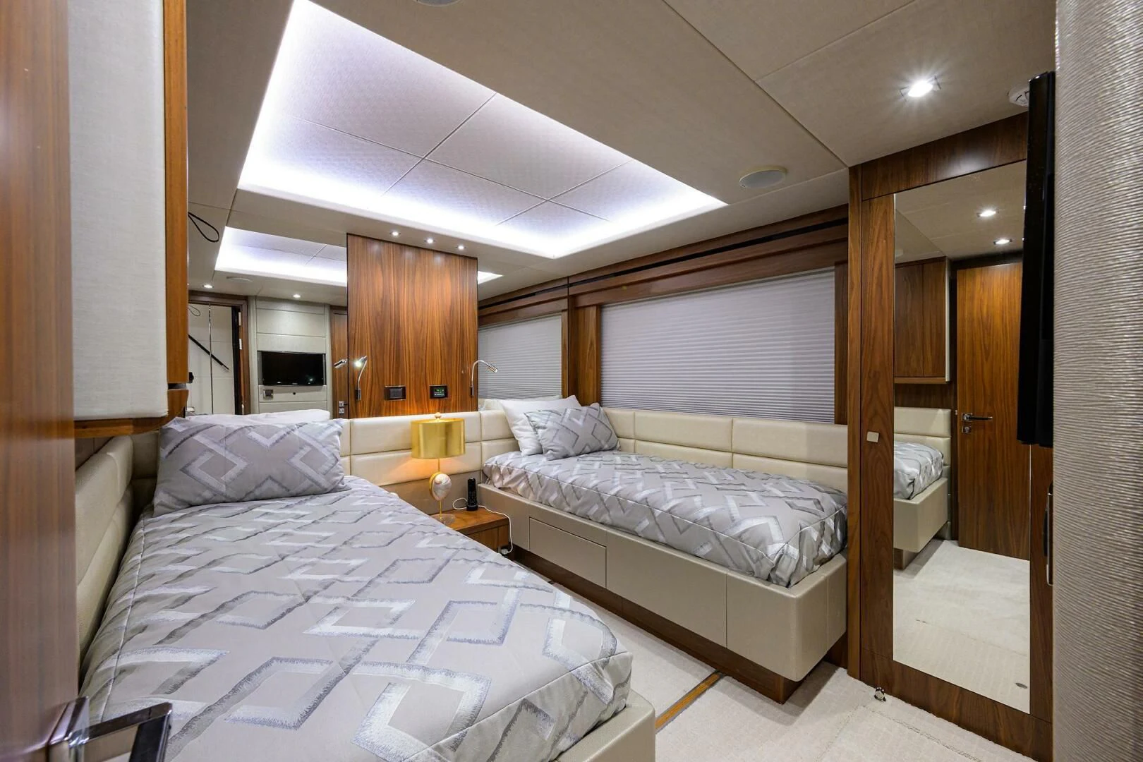 a room with two beds aboard SKYCHASER Yacht for Sale