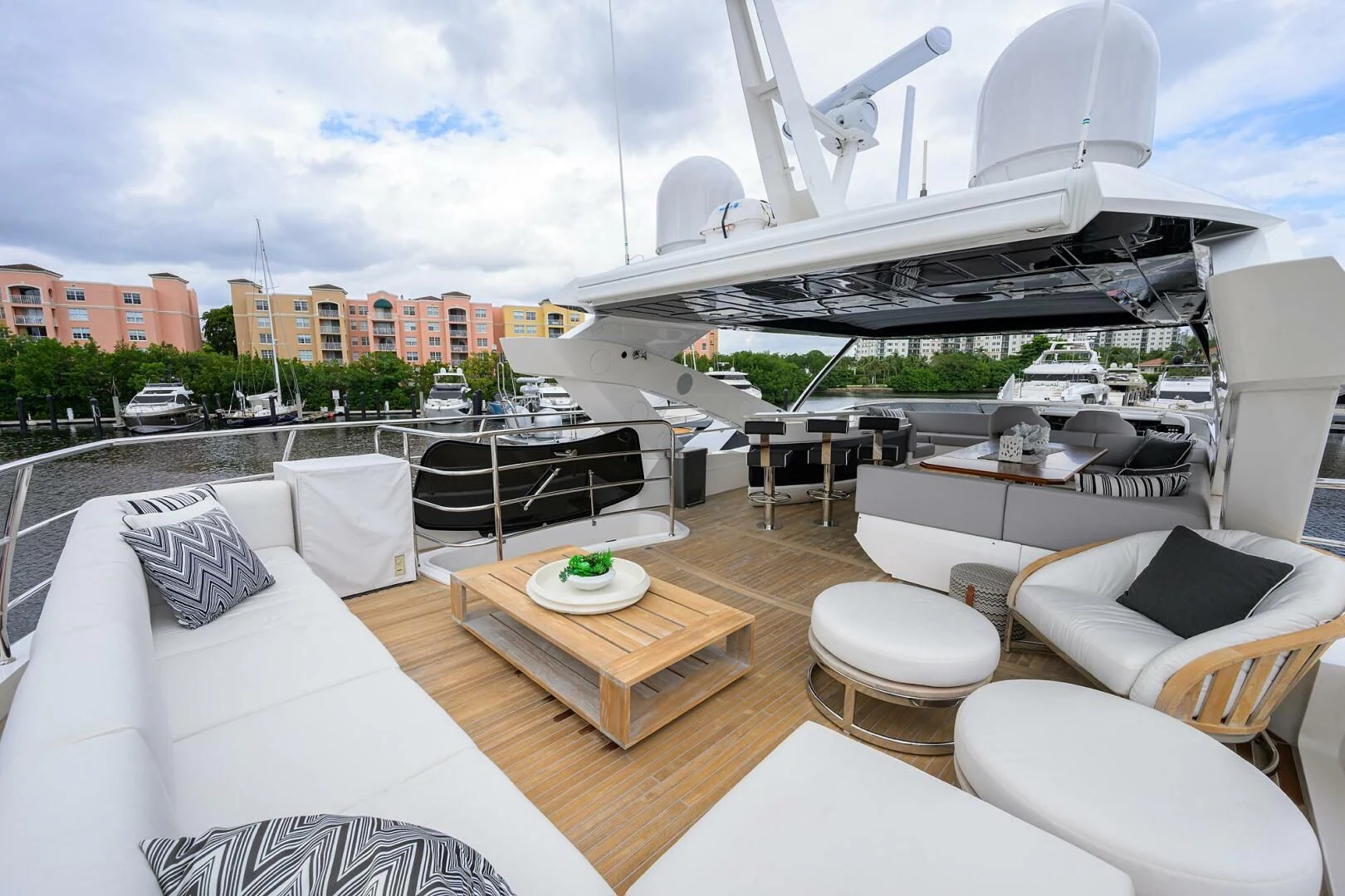 a room with a table and chairs aboard SKYCHASER Yacht for Sale
