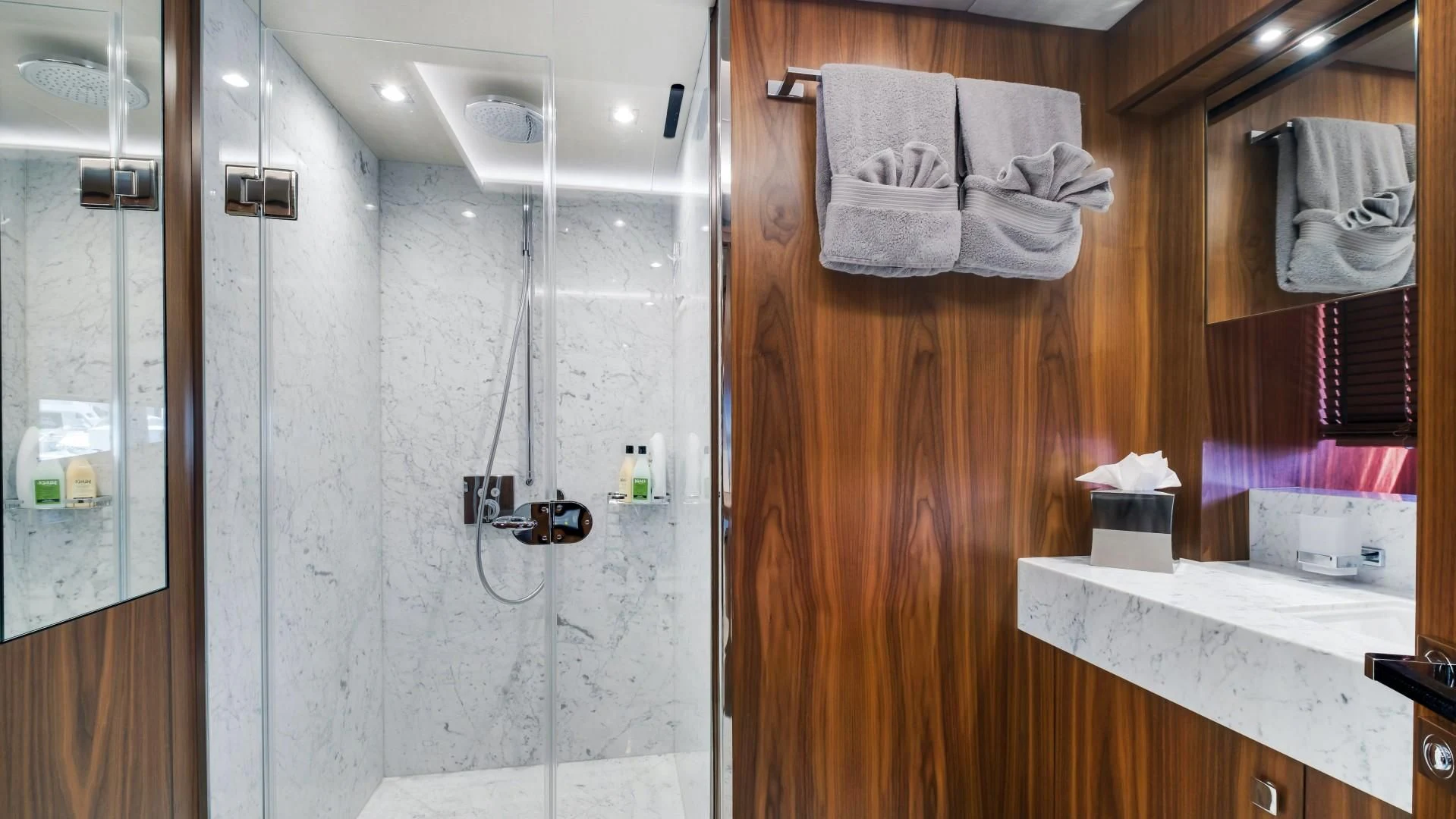 a bathroom with a shower aboard SKYCHASER Yacht for Sale