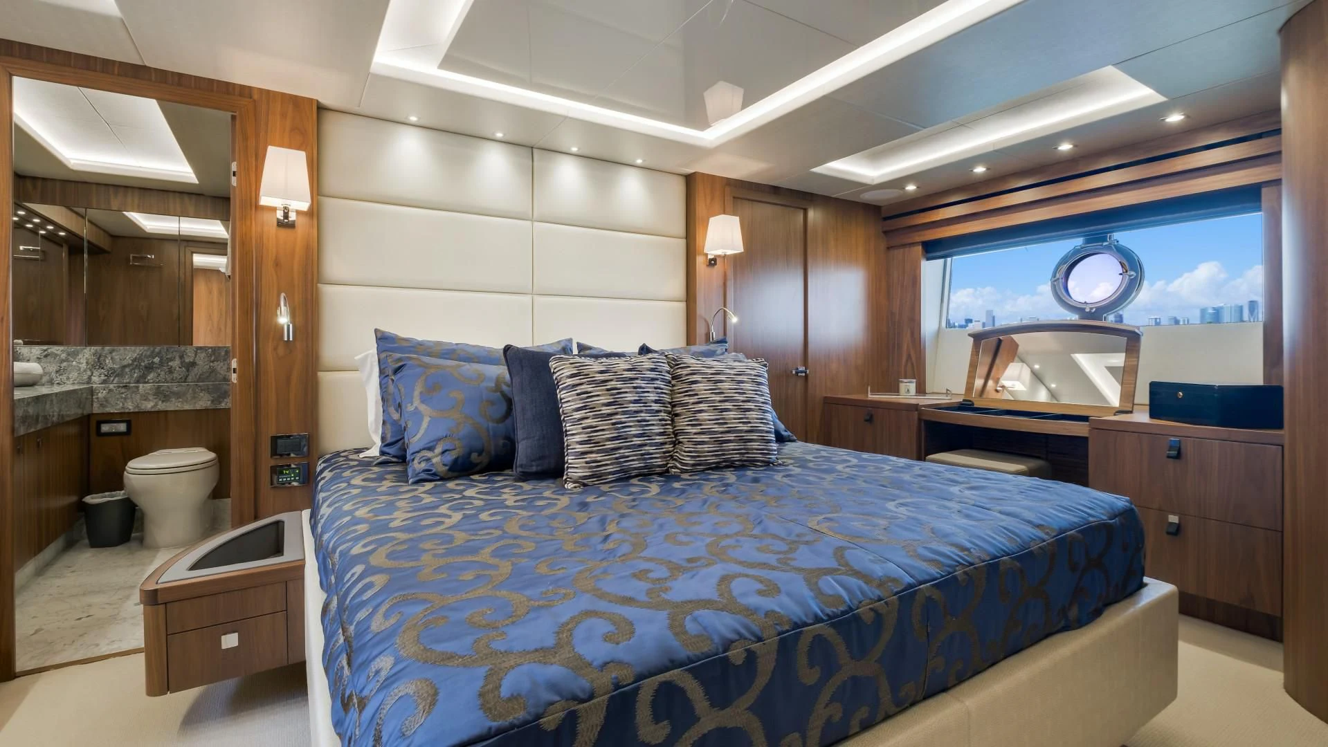 a large bed in a room aboard SKYCHASER Yacht for Sale