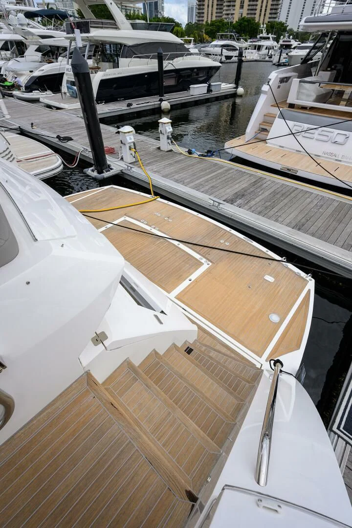 a boat deck with many boats aboard SKYCHASER Yacht for Sale