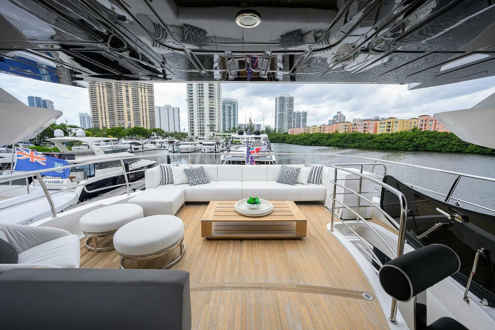a room with a table and chairs aboard SKYCHASER Yacht for Sale