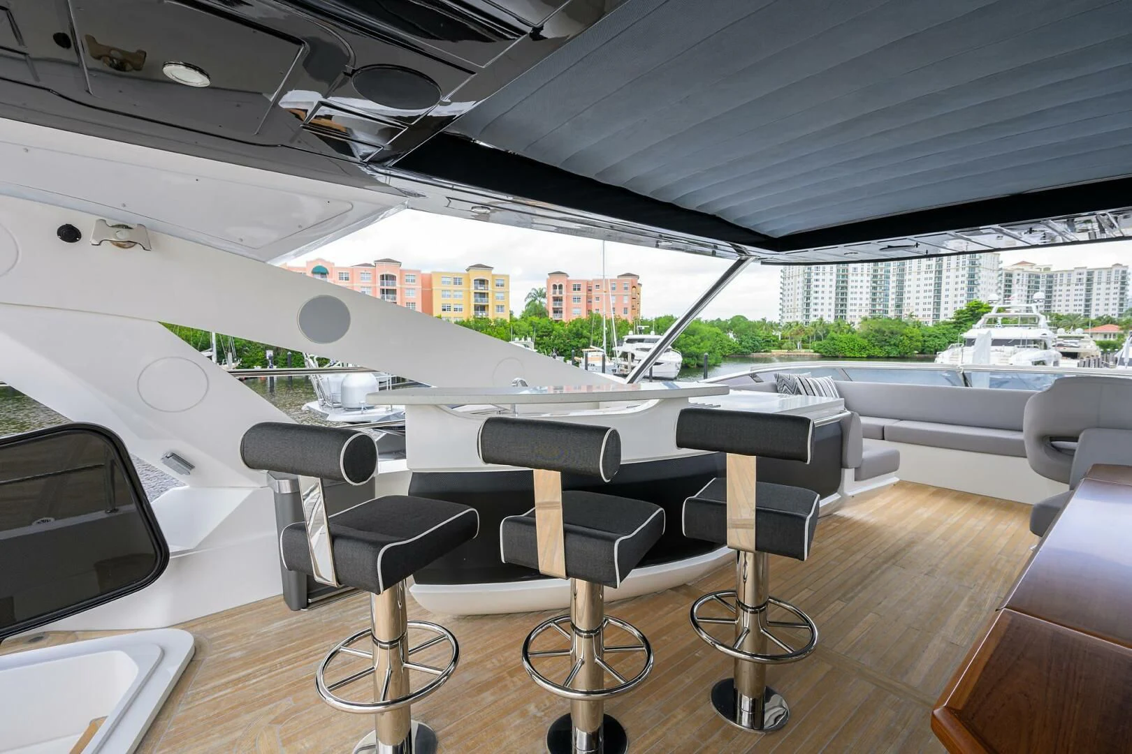 a room with a table and chairs aboard SKYCHASER Yacht for Sale