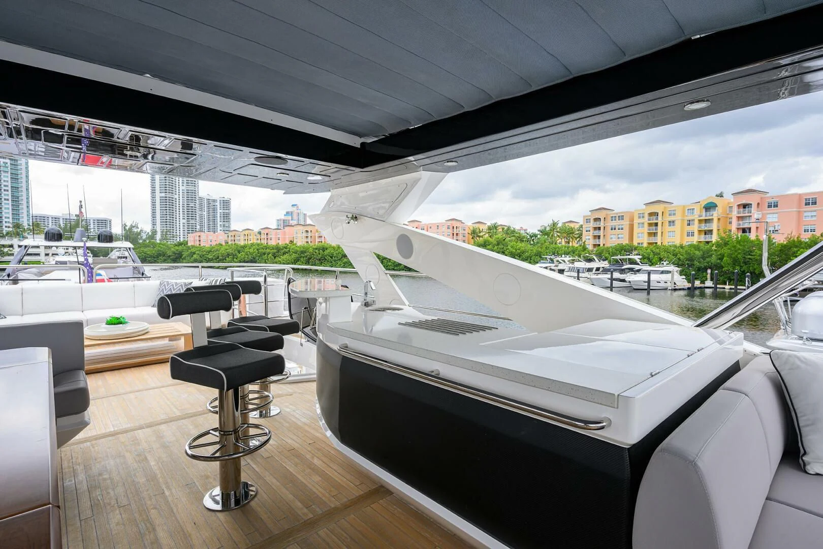 a room with a table and chairs aboard SKYCHASER Yacht for Sale