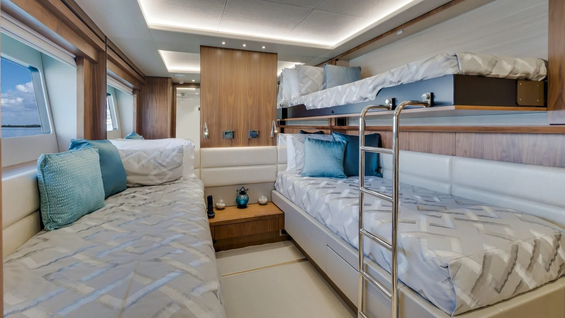 a couple of beds in a room aboard SKYCHASER Yacht for Sale
