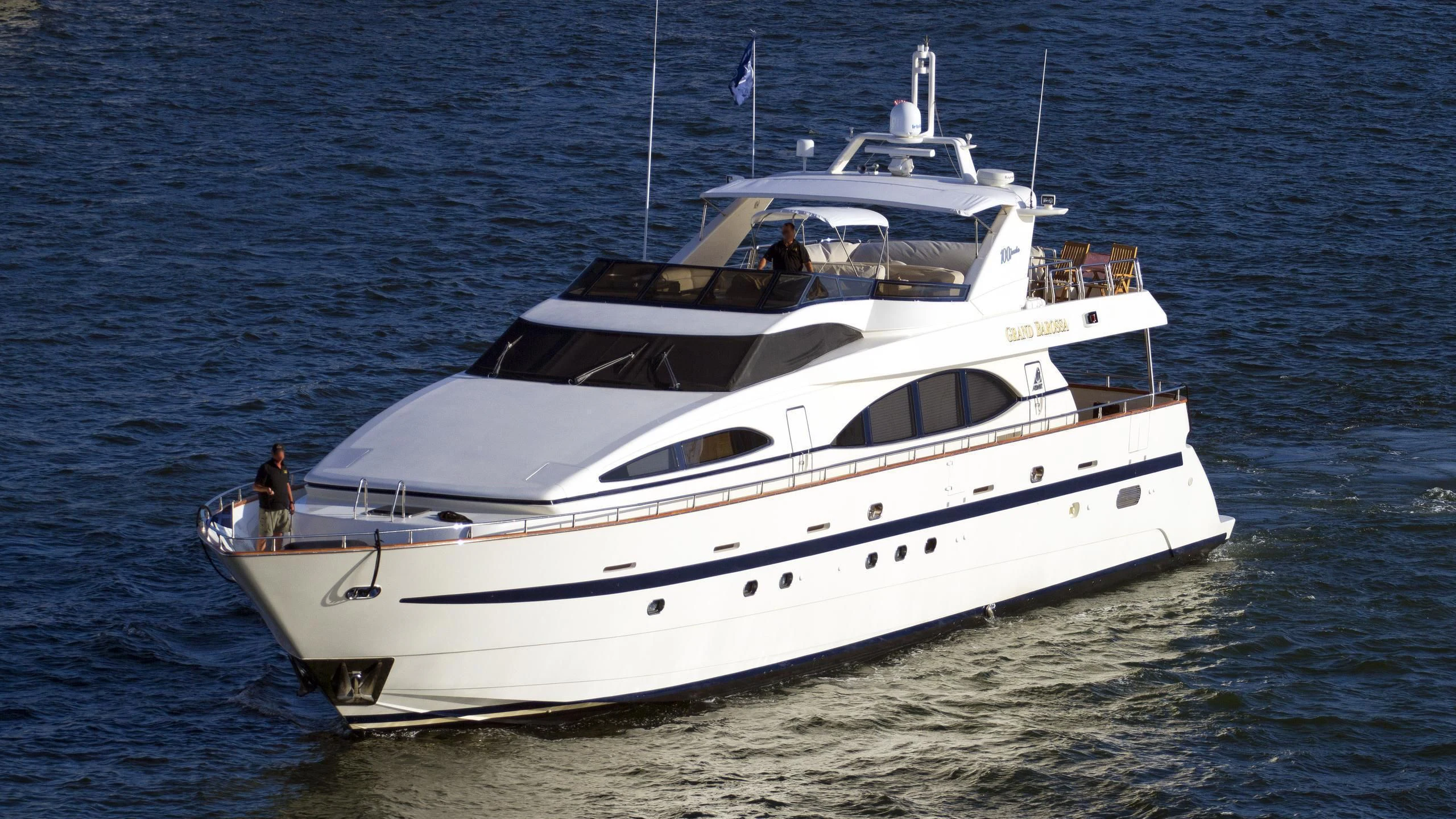 a white boat on the water aboard ENDLESS SUN Yacht for Sale