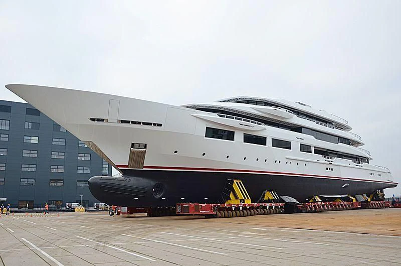 a large cruise ship docked aboard SHODAN Yacht for Sale