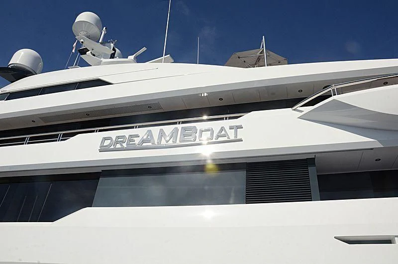 a white boat with a satellite dish on top aboard SHODAN Yacht for Sale