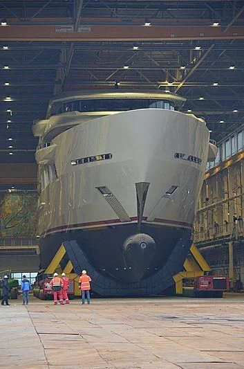 a large military ship in a warehouse aboard SHODAN Yacht for Sale