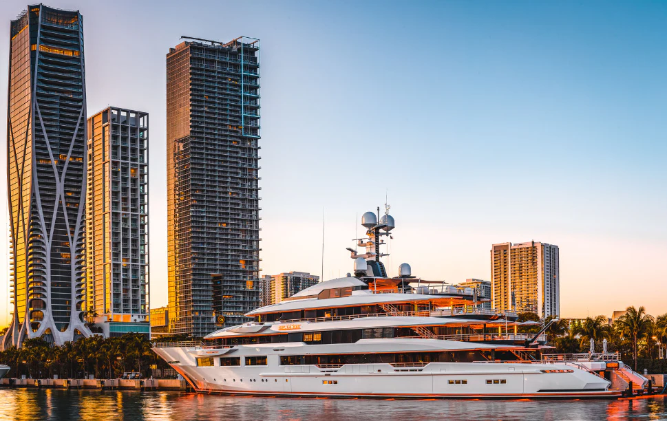 a large white boat in a city aboard SHODAN Yacht for Sale
