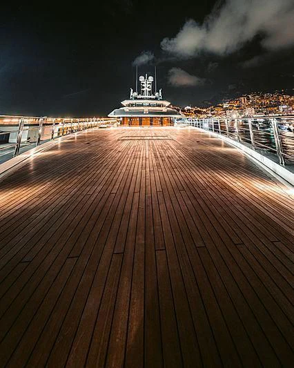 a large building with a large crowd of people around it aboard SHODAN Yacht for Sale