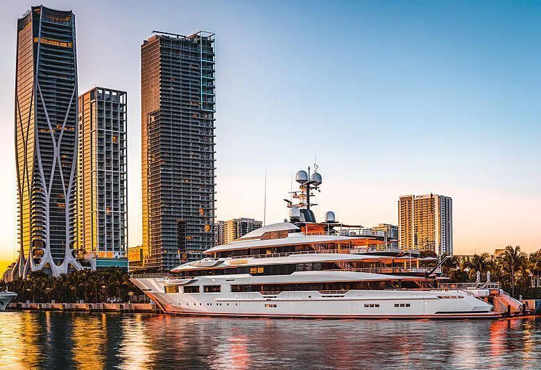 a large boat in a harbor aboard SHODAN Yacht for Sale