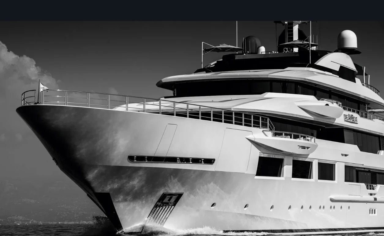 a large ship in the water aboard SHODAN Yacht for Sale