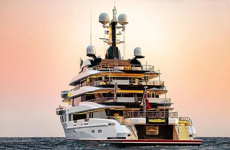 a large ship in the water aboard SHODAN Yacht for Sale