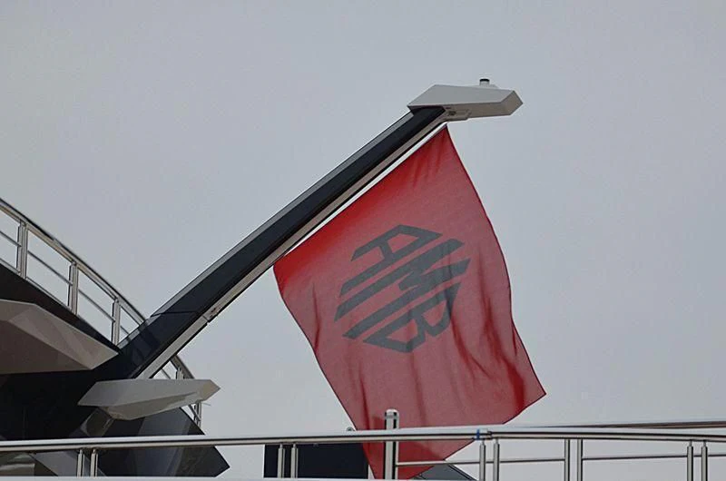 a red and white flag aboard SHODAN Yacht for Sale