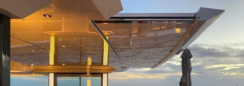a satellite over a planet aboard SHODAN Yacht for Sale