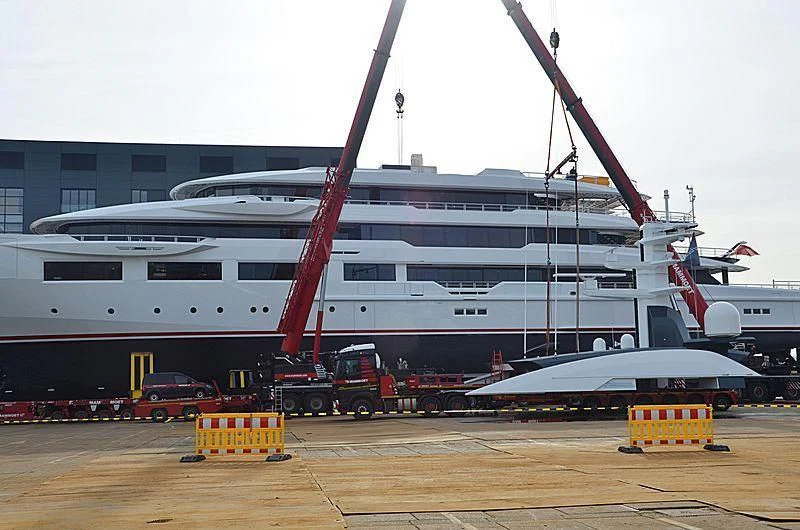a large white ship docked aboard SHODAN Yacht for Sale