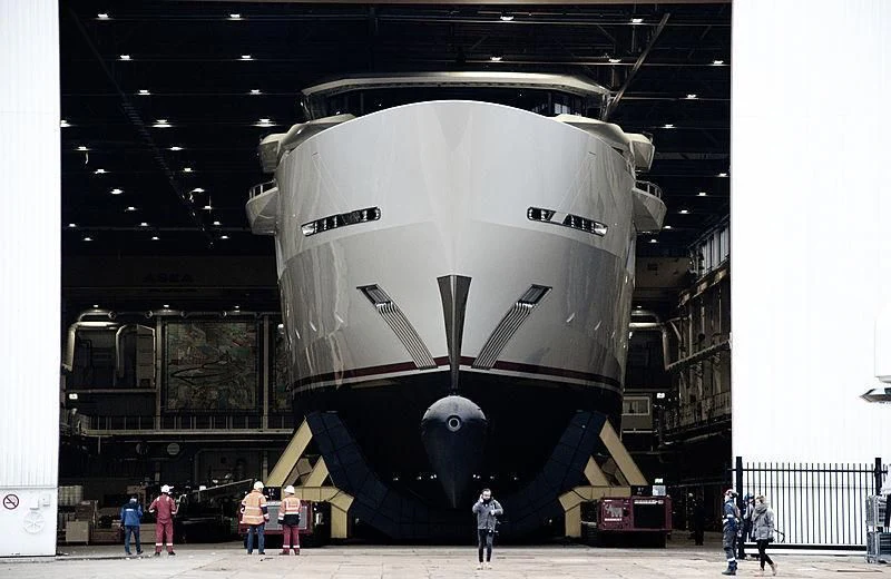 a large black airplane aboard SHODAN Yacht for Sale