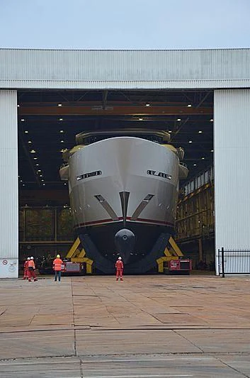 a large space shuttle in a warehouse aboard SHODAN Yacht for Sale