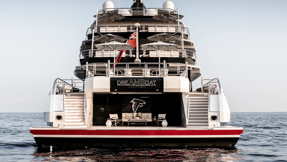 a large ship in the water aboard SHODAN Yacht for Sale