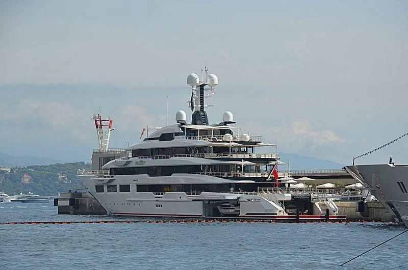 a large ship in the water aboard SHODAN Yacht for Sale