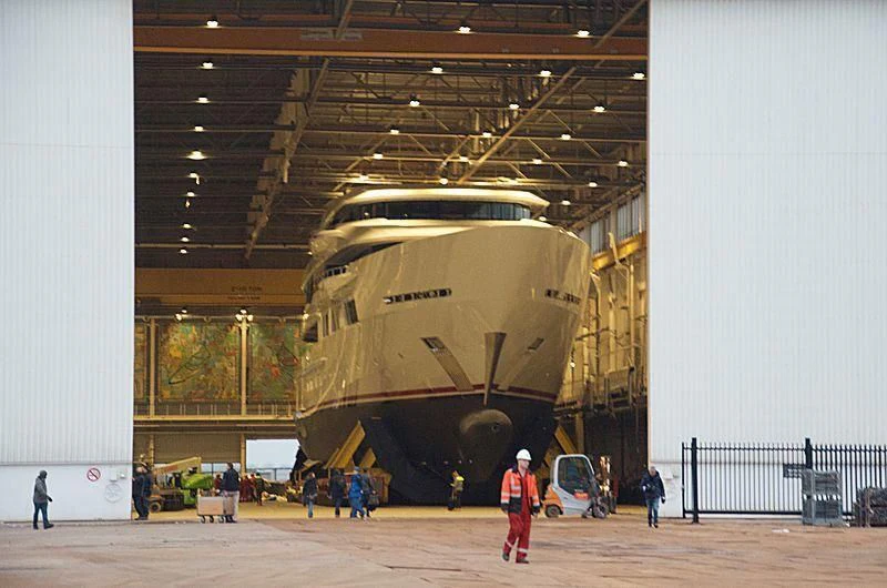 a large yellow and black space shuttle aboard SHODAN Yacht for Sale
