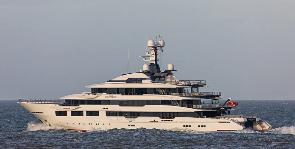a large ship in the water aboard SHODAN Yacht for Sale
