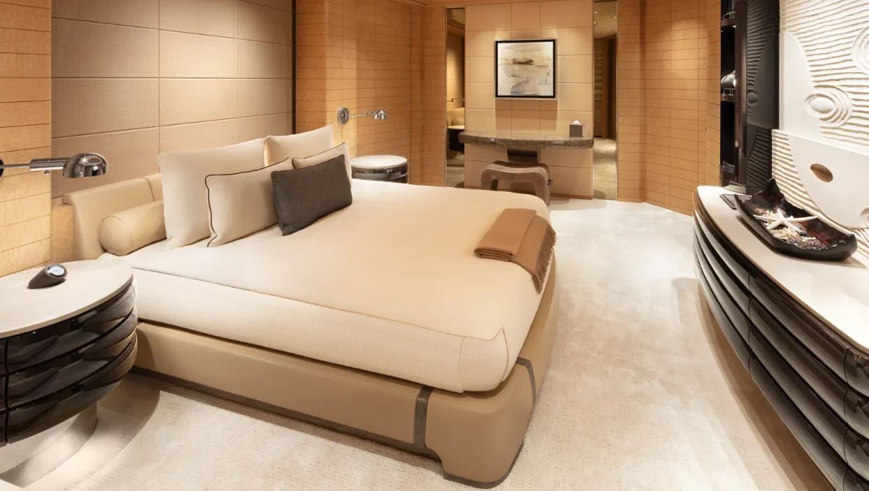 a large white bed in a room aboard SHODAN Yacht for Sale