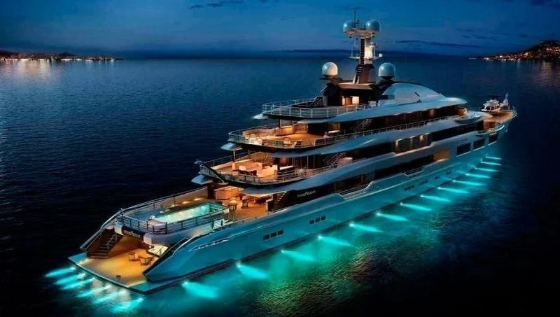 a large ship in the water aboard SHODAN Yacht for Sale