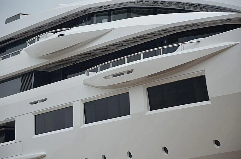 a white building with a black and silver roof aboard SHODAN Yacht for Sale