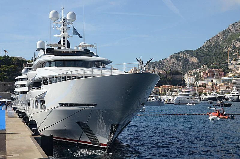 a large white yacht in the water aboard SHODAN Yacht for Sale