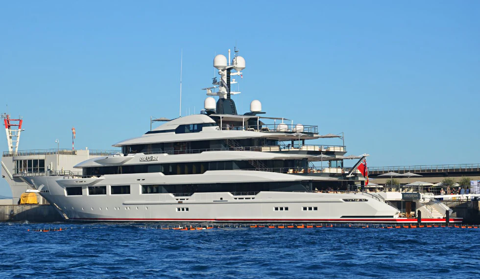 a large white boat in the water aboard SHODAN Yacht for Sale