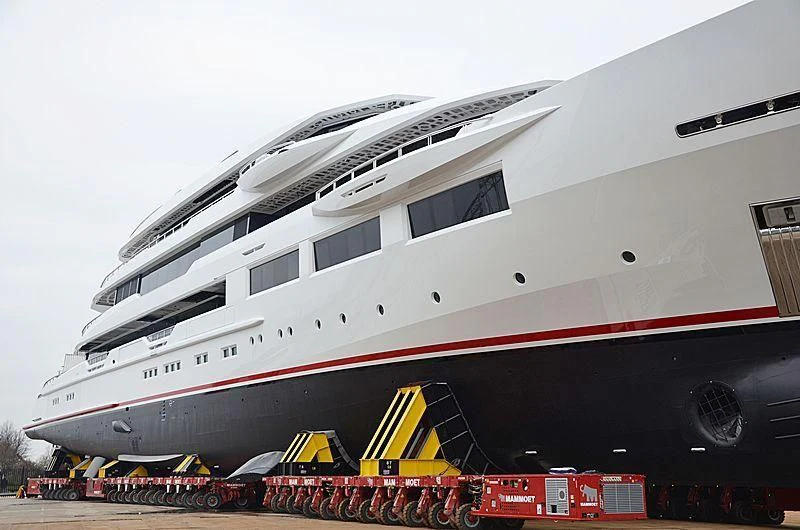 a large cruise ship docked aboard SHODAN Yacht for Sale