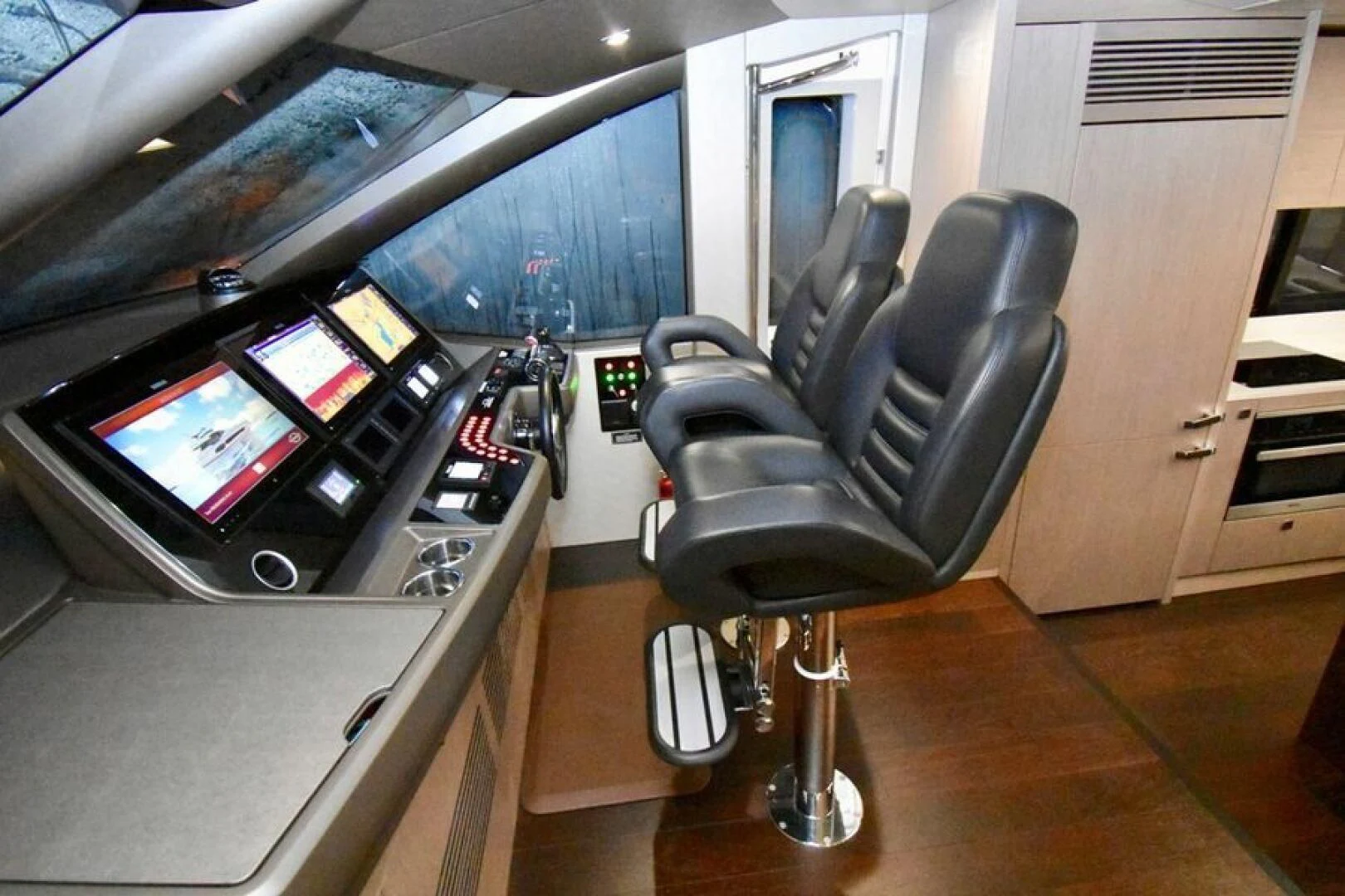 a room with a computer and a chair aboard DO IT ANYWAY Yacht for Sale