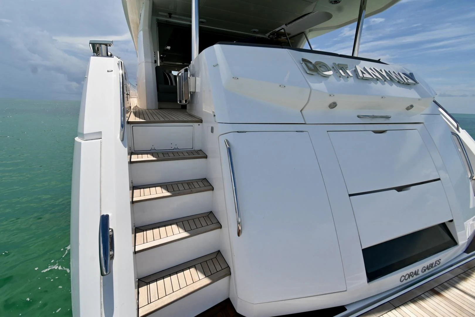 a white boat on a trailer aboard DO IT ANYWAY Yacht for Sale