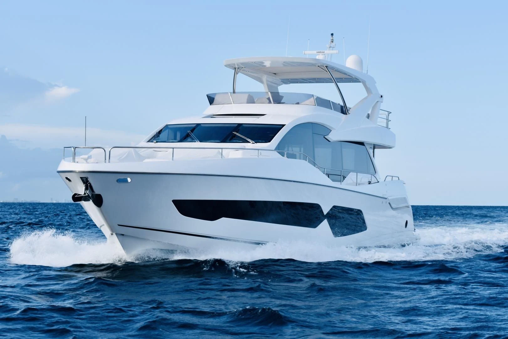 a white yacht in the ocean aboard DO IT ANYWAY Yacht for Sale